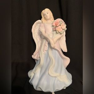 Porcelain Angel Light. Electric. Plug in. Avon brand. Beautiful.